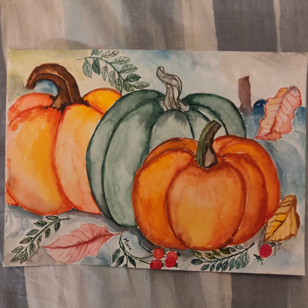 Watercolor painting pumpkins
